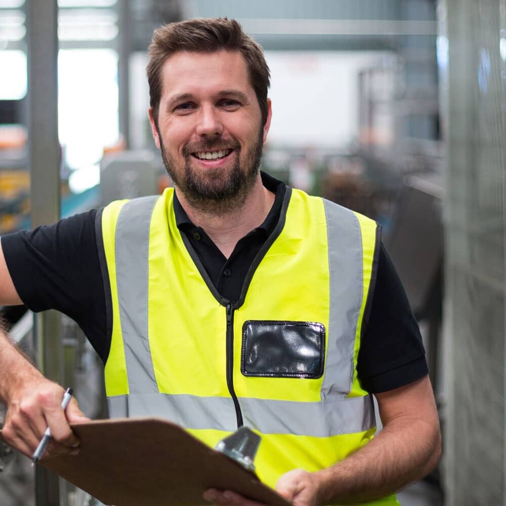 factory worker with clipboard